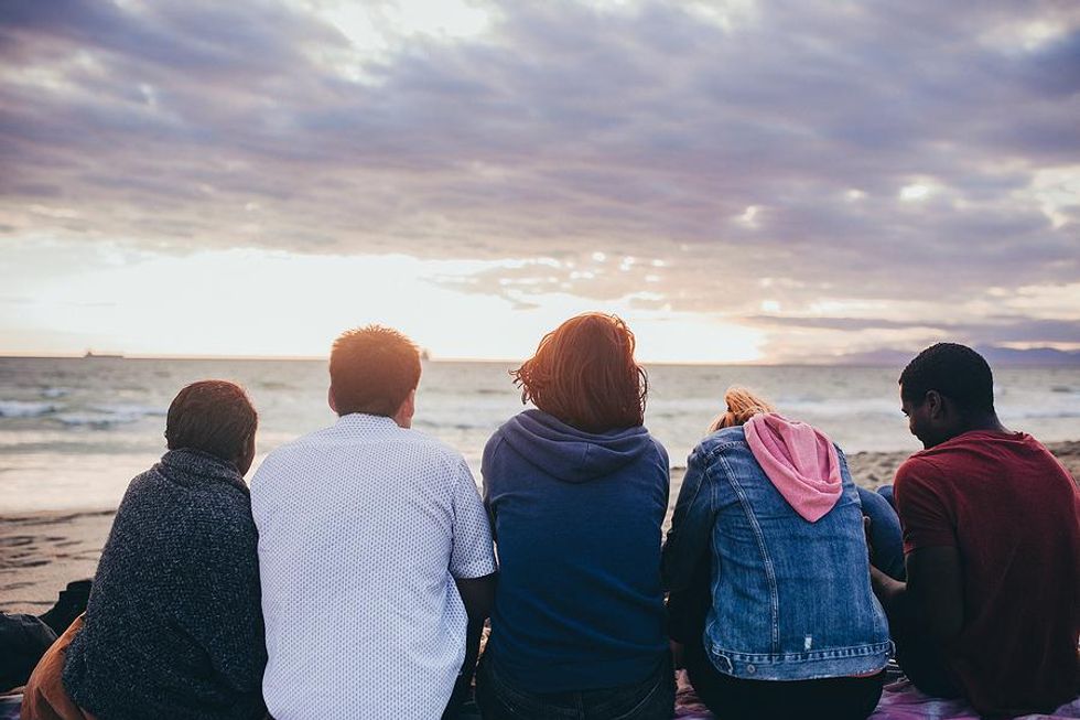 Coworkers visit the beach after work