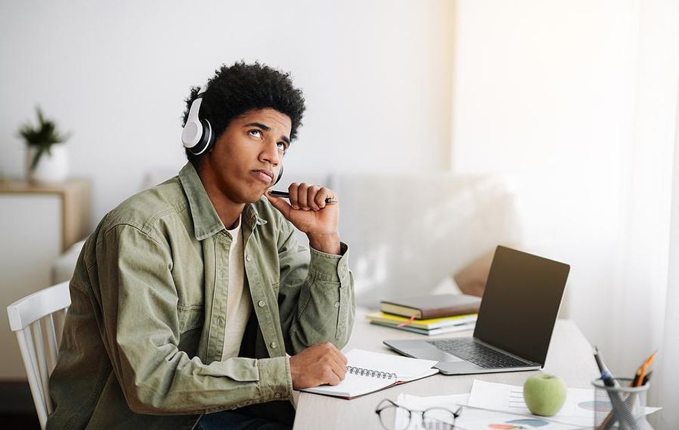 Man thinks about improving his time management skills