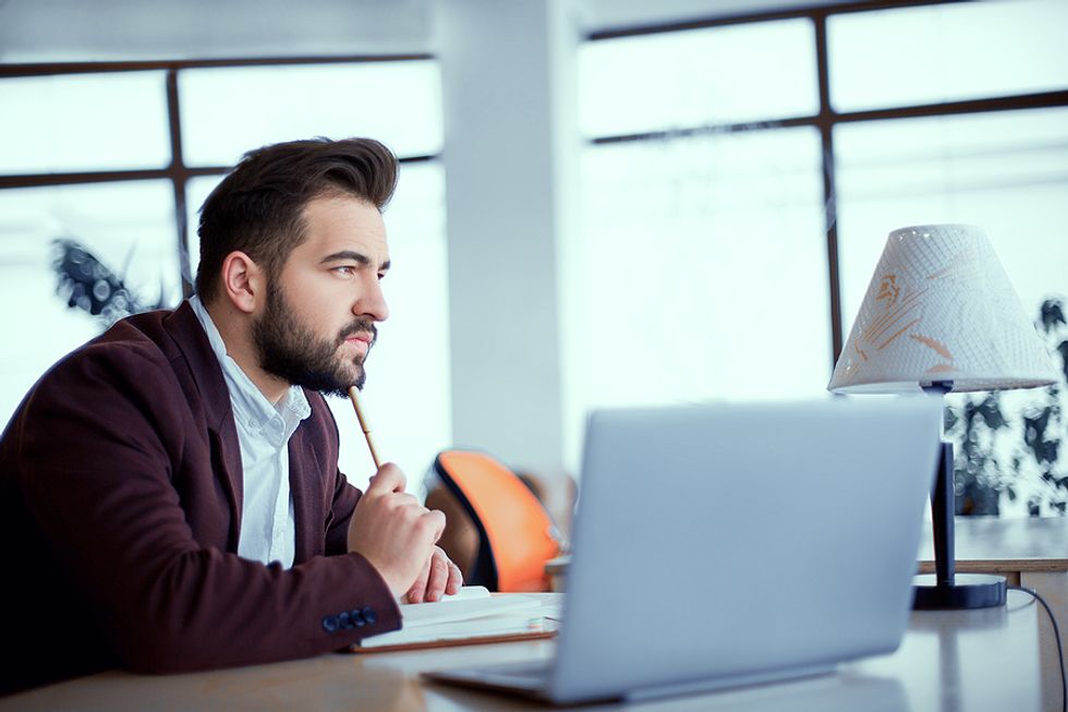 Man thinks about quantifying his accomplishments on his resume instead of adding fluff