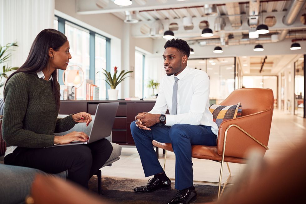 Man answers a question during a mock interview