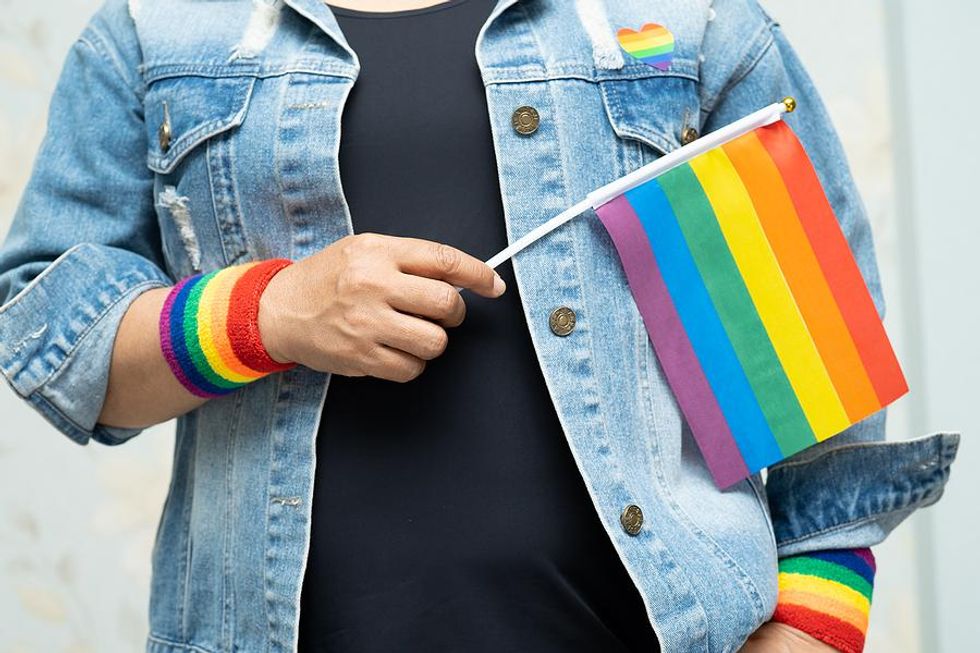 Employee wears Pride merchandise at work