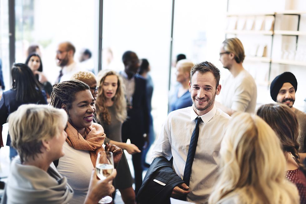 Group of people at a networking event during the summer