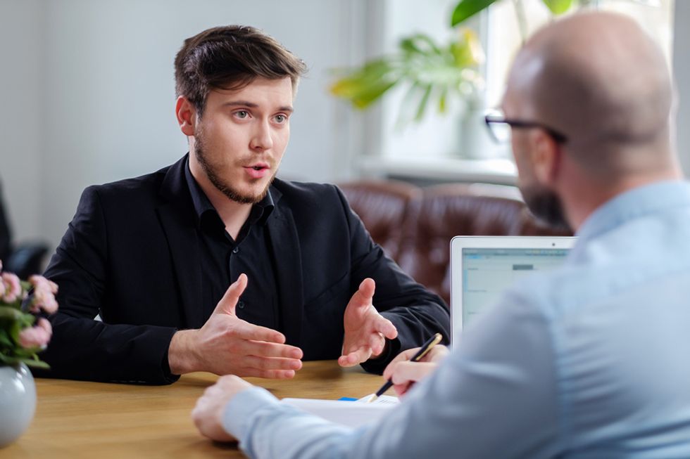 Job candidate talks and doesn't appear overconfident in an interview