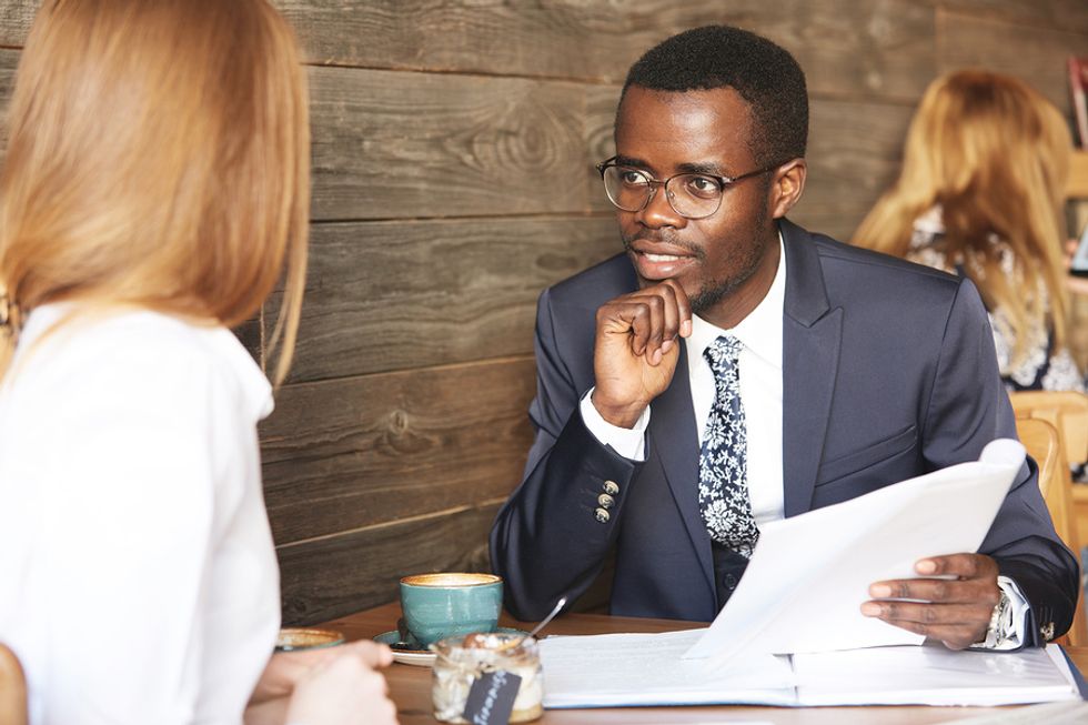 Interviewer ask job candidate if they are a team player