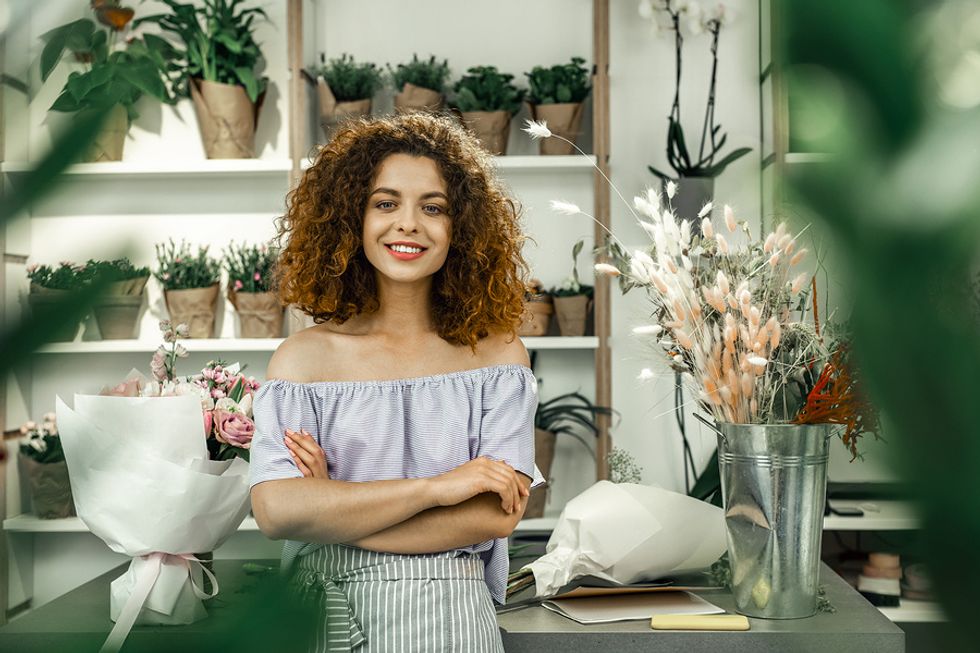 Young woman works a part-time job while seeking a full-time position