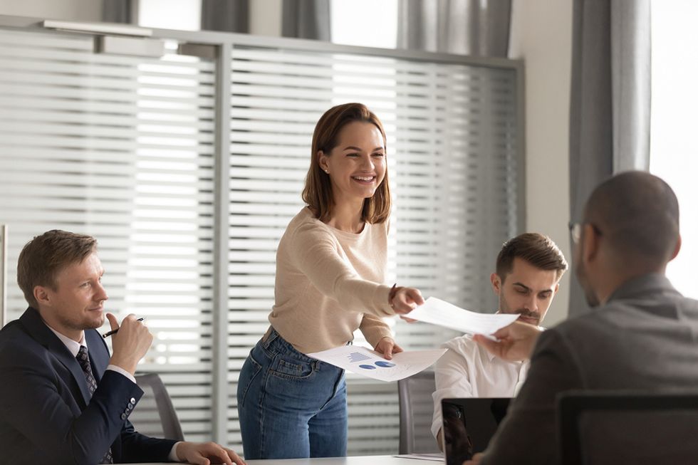 Woman leader at work being enthusiastic about the work that lies ahead