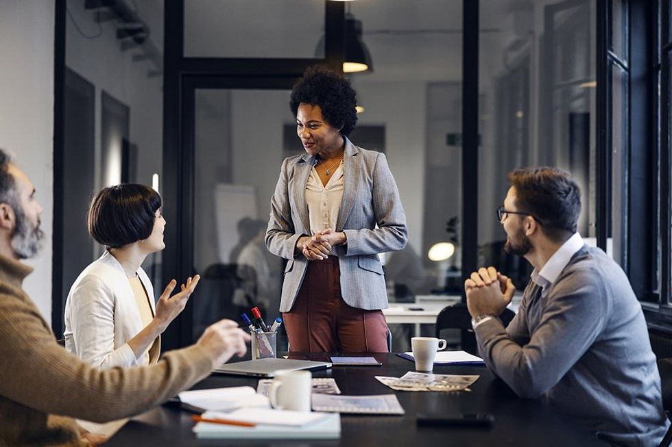 CEO leads a team meeting about company culture