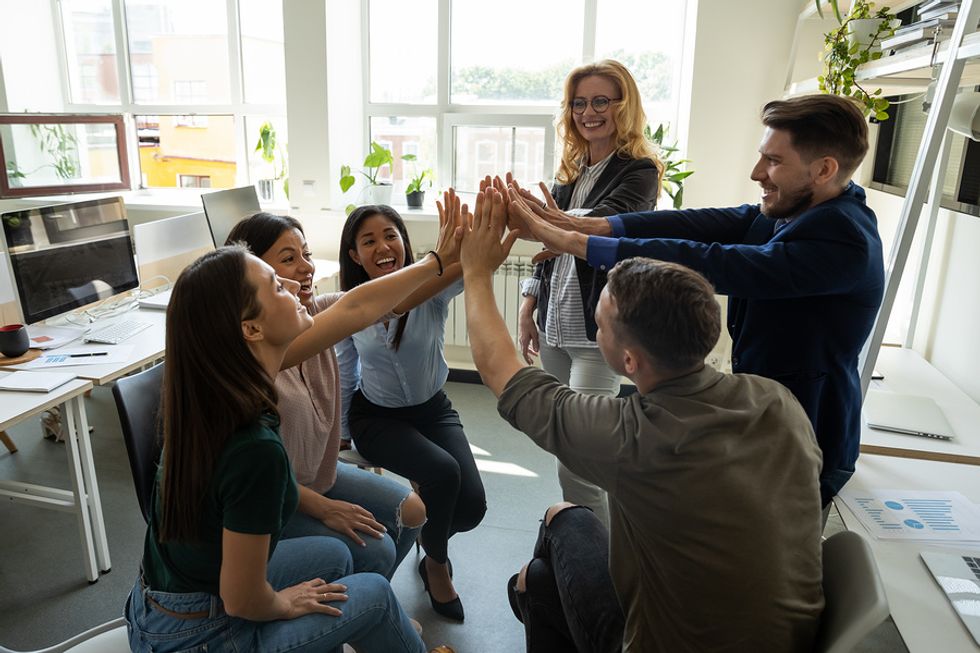 Team of employees stay connected during the digital age