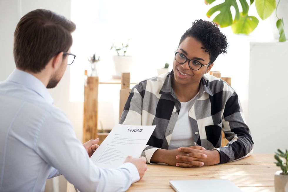 Job seeker conveying three things during a job interview