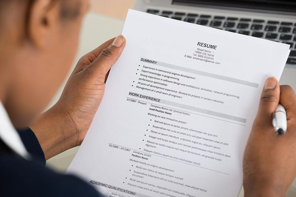 Man reads a resume