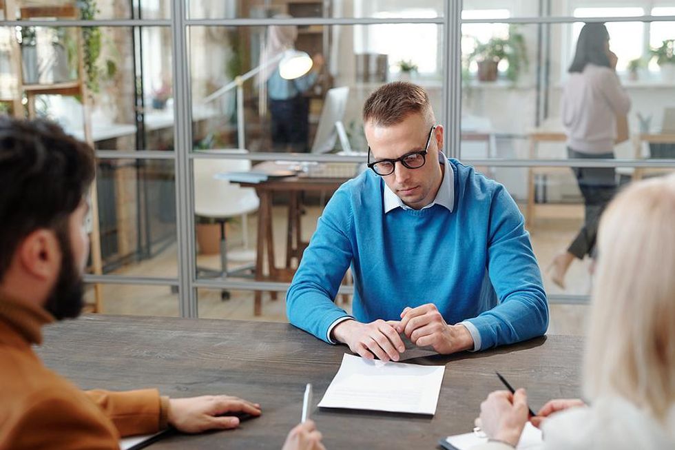 Man feels uncomfortable during an interview with the hiring manager