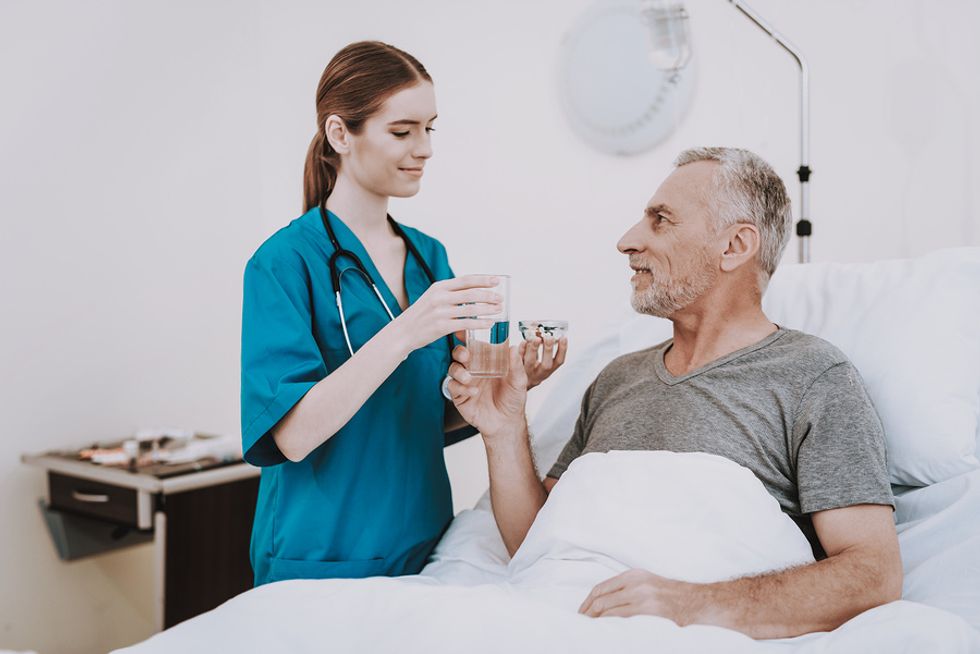 Nurse takes care of her patient