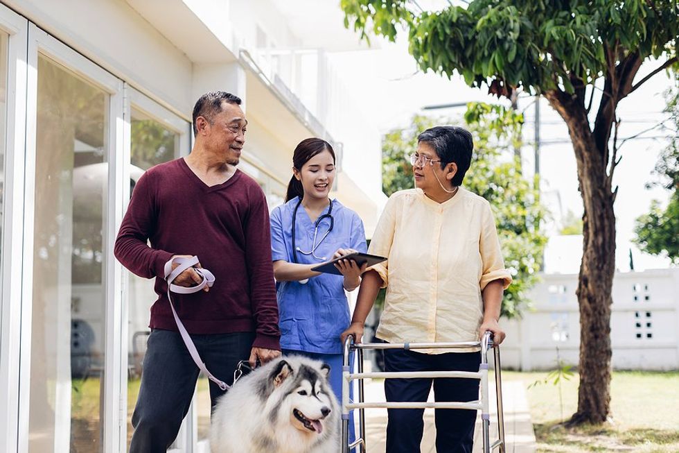 Nurse talks to patient and her family