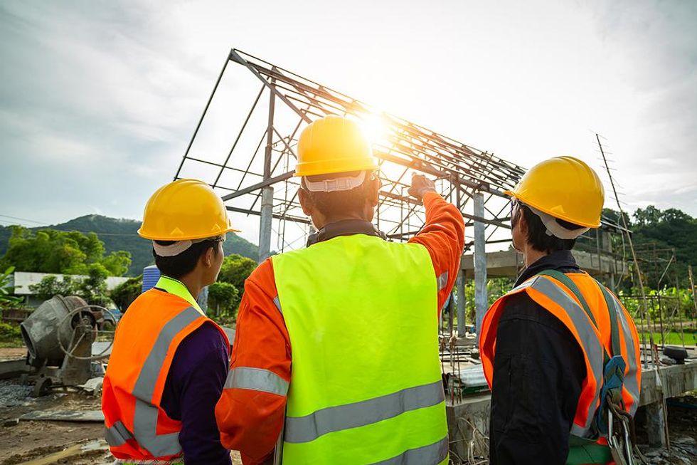 Manager talks to employees about workplace safety