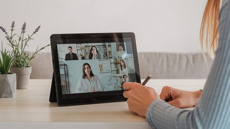 Woman attends a remote workshop