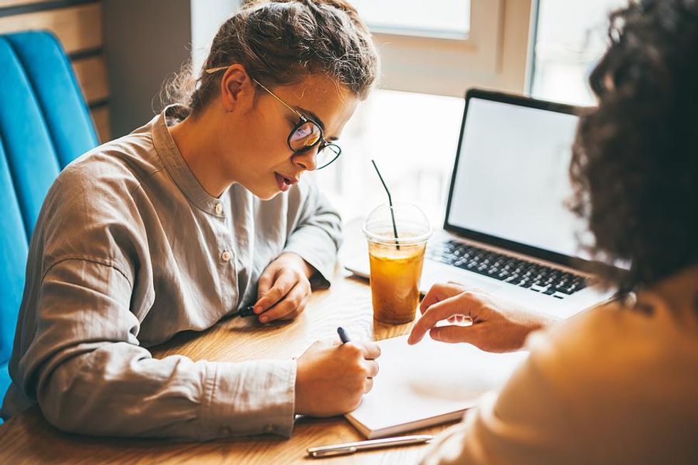 Woman identifies her strengths with a career coach before a job interview