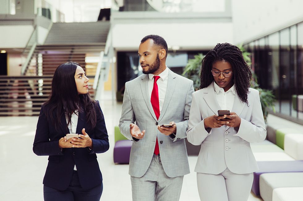 Woman networks with coworkers to try to relaunch her career