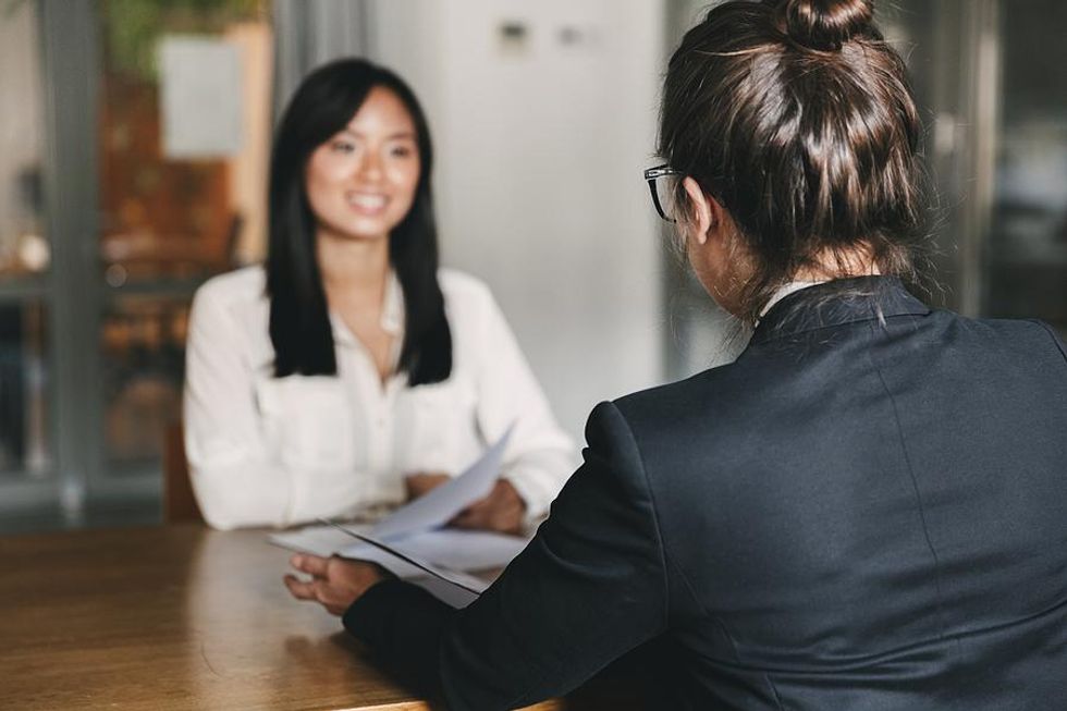 Woman demonstrates her value in a job interview