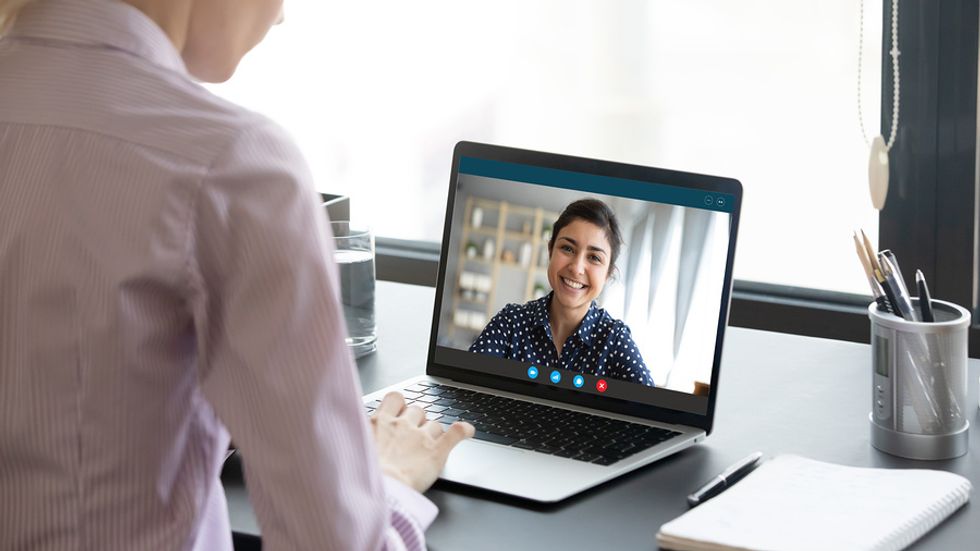 Woman on a video interview with a hiring manager